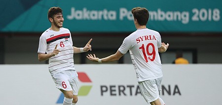 Tại sao trên áo cầu thủ Syria không có tên sau lưng?